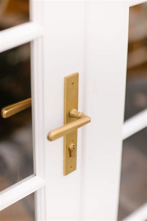 Iver's Copenhagen door lever in brushed brass is the perfect door handle for your front doors ...