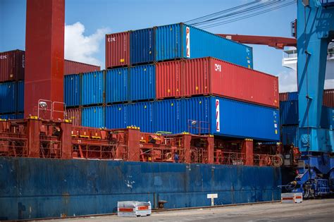 red and blue intermodal containers pile free image | Peakpx