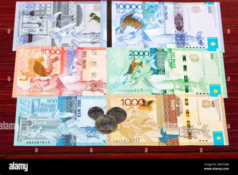 Kazakhstani money - tenge - coins and banknotes Stock Photo - Alamy