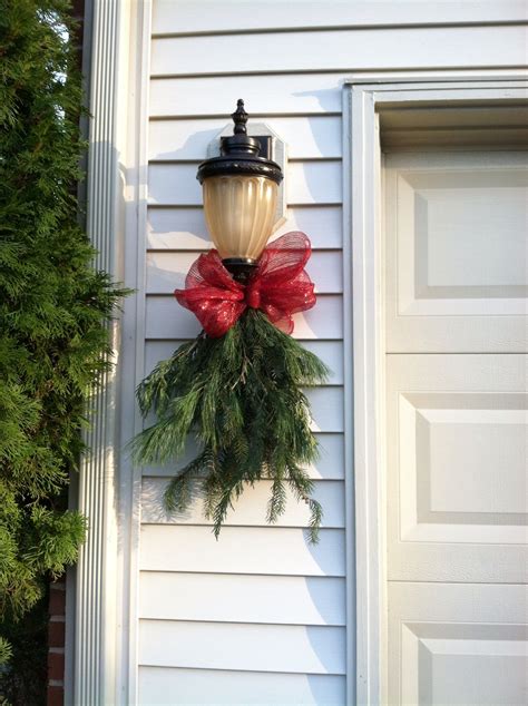 Garage light swags | Outside christmas decorations, Decorating with christmas lights, Christmas ...