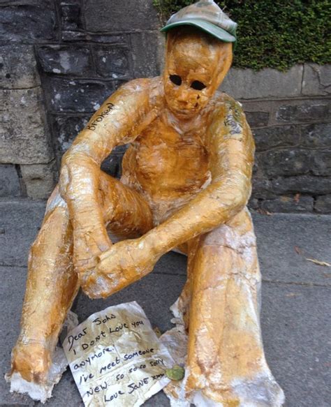 'Crying' statue appears outside Bristol church - BBC News