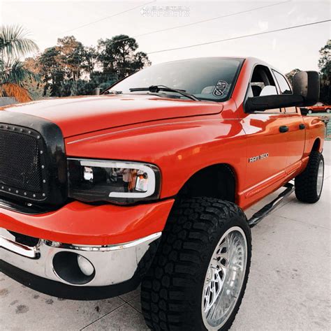 2004 Dodge Ram 1500 with 22x12 -51 Cali Offroad Switchback and 35/12.5R22 RBP Repulsor Mt Rx and ...