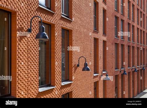 Modern brick business building. Wall, windows and lanterns Stock Photo ...