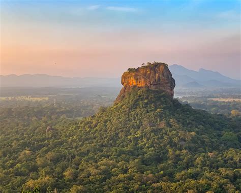 Lion Rock in Sigiriya Sri Lanka as seen from Pidurangala Rock at sunrise. The 360 views from ...