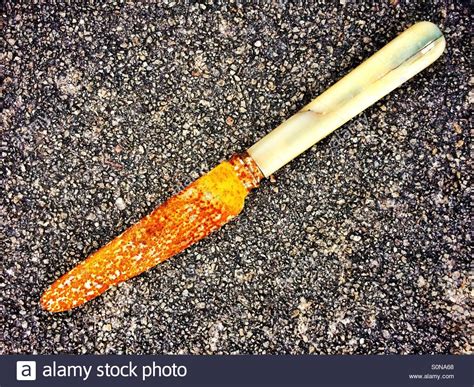 An old rusty knife Stock Photo - Alamy