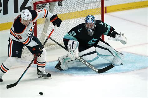 Kraken feel solid with duo of Grubauer, Driedger in goal | AP News