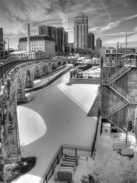 Different winter view from the Stone Arch Bridge downtown Minneapolis ...