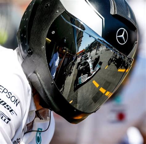 The Mercedes pit crew helmets are way too cool | Helmet, Mercedes amg, Mercedes