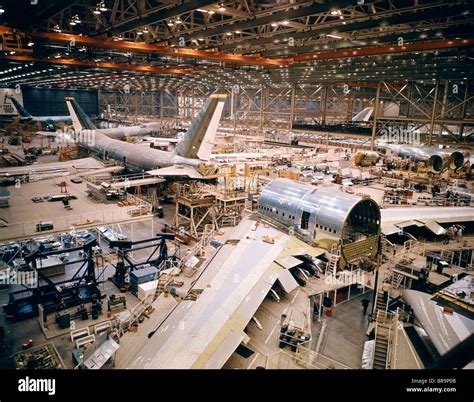 1960s AIRPLANE REPAIR CONSTRUCTION IN HANGER Stock Photo - Alamy