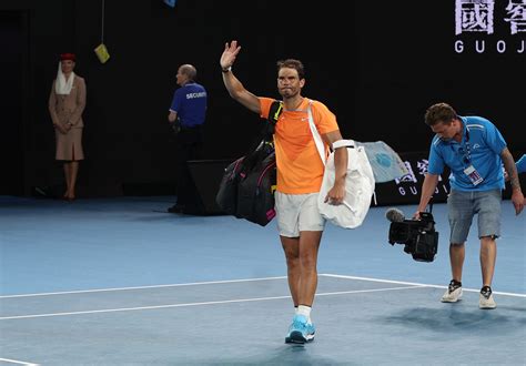 Injured champion Nadal crashes out of Australian Open | Reuters