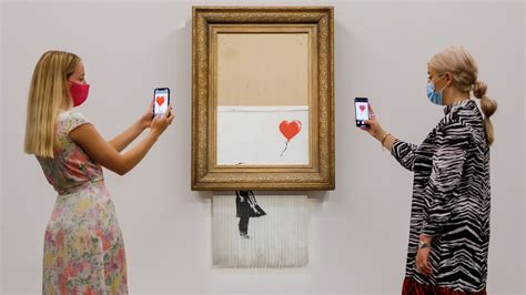 A partially shredded Banksy sells at auction for $25.4 million : NPR