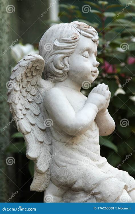 Cupid Sculpture in the Garden Stock Photo - Image of decorated, child: 176265008