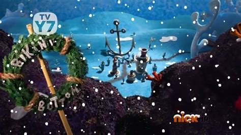 an animated christmas scene with snow falling on the ground