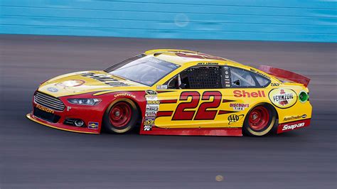 Logano wins pole at Martinsville Speedway