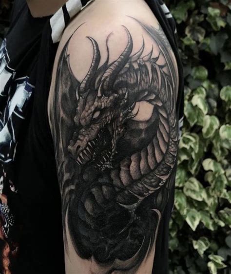 Pin by Emily Coe on Small tattoos | Dragon sleeve tattoos, Dragon tattoos for men, Dragon tattoo arm