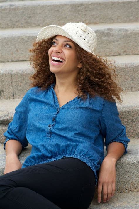 Happy Woman Sitting Outdoors and Laughing Stock Photo - Image of cute, adult: 34391556