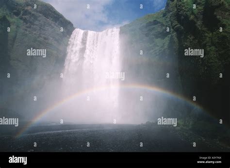 waterfall Skogafoss and rainbow, Iceland Stock Photo - Alamy