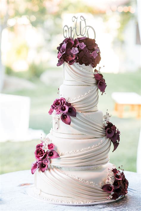 Classic Ivory Cake with Draping and Dramatic Purple Flowers