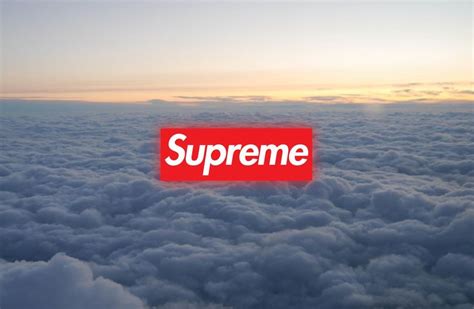 the supreme logo is seen above some clouds