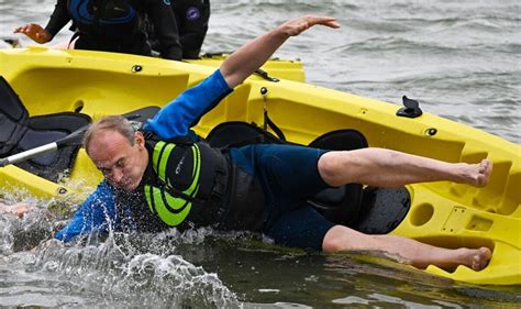 Ed Davey tipped into the sea as he goes kayaking at conference in ...