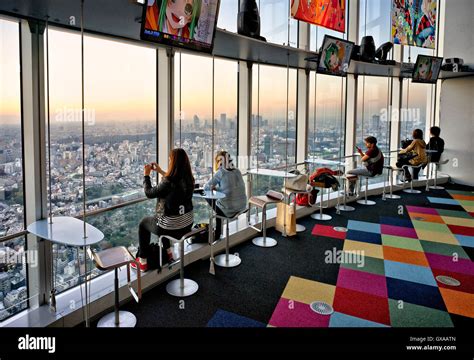 Japan, Honshu island, Kanto, Tokyo, sunset overview from a lounge bar ...