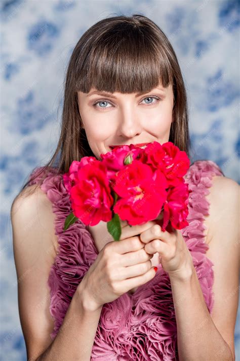 Premium Photo | Beautiful woman with flowers happy smiling