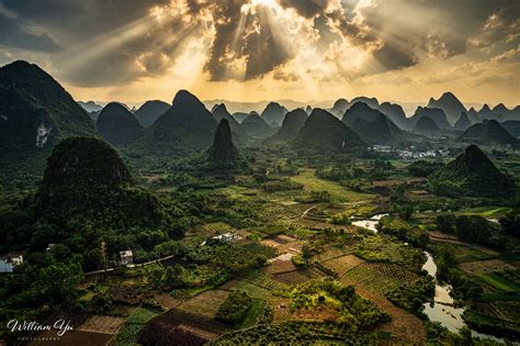 Dramatic sky over Karst hills of Yangshuo by William Yu Photography on YouPic