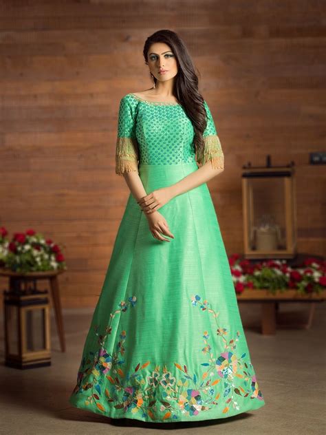 Pastel green gown with beautiful tassels and colourful handwork. | Bridal wear, Formal dresses ...