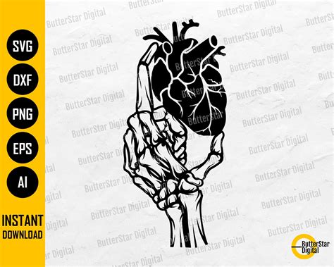 Skeleton Hand Holding Heart Tattoo