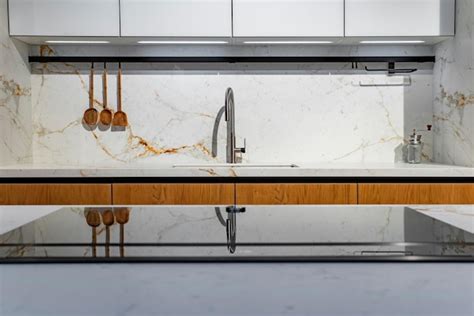 Premium Photo | Kitchen set with white marble and black elements