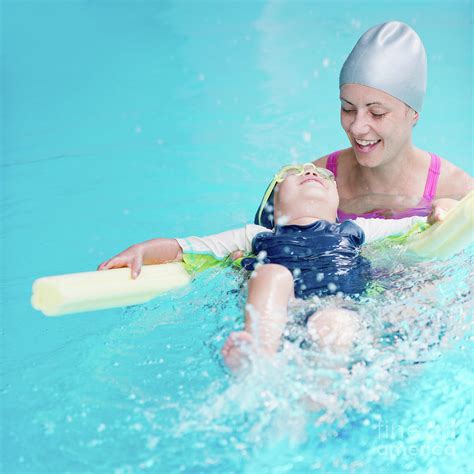 Boy Learning To Swim Photograph by Microgen Images/science Photo ...