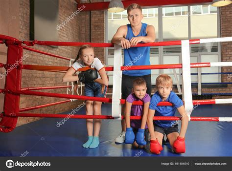 Little Children Trainer Boxing Ring — Stock Photo © belchonock #191404510