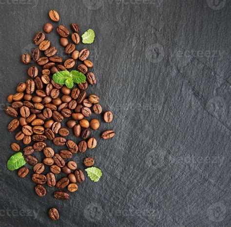 Coffee beans on a black background 5385897 Stock Photo at Vecteezy