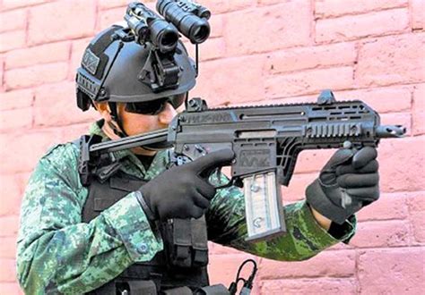 Military working on 10 weapons projects, including automatic pistol