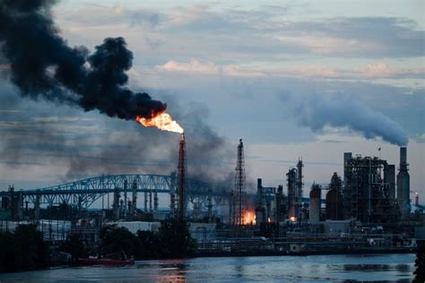 Small fire burns at oil refinery that shook with explosions | The Seattle Times