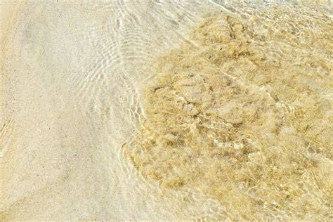 Small mini water waves at beach ocean with sand Mexico. 26943666 Stock Photo at Vecteezy