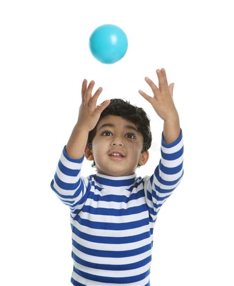 Toddler Attempting To Catch A Ball Stock Image - Image: 17902307