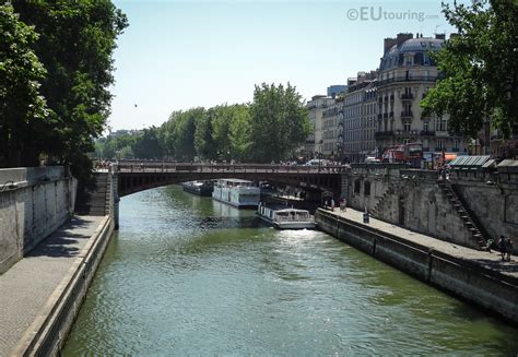 A short bridge named Pont au Double connecting over the River Seine to the island in the centre ...