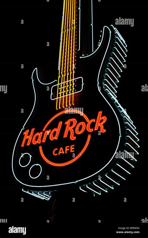 Logo sign neon guitar outside hi-res stock photography and images - Alamy