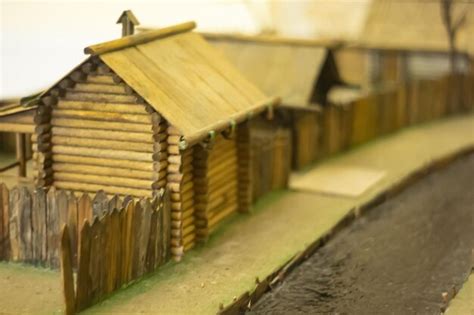 Premium Photo | Miniature toy house in the garden wooden houses in the village handmade housework