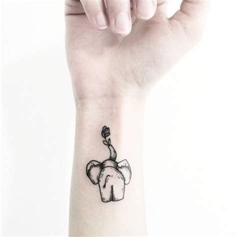 Back-Small-Elephant-Tattoo-Designs | girlterestmag