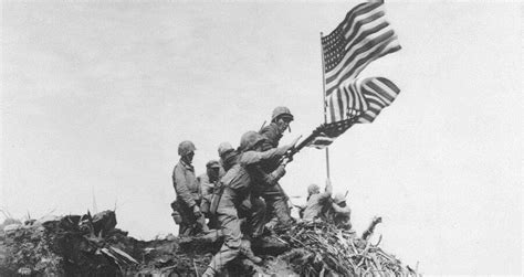 Raising The Flag On Iwo Jima: The Story Behind WW2's Most Iconic Photo