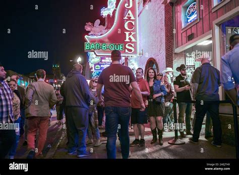 People enjoy Broadway by night in Nashville. This historic street in Music Row is famous for its ...