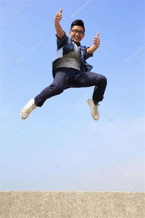 Happy man jumping ⬇ Stock Photo, Image by © ryanking999 #70135653