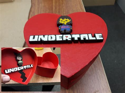 I made a Undertale heartshaped box! With Frisk on the front, and Chara on the back of the lid ...