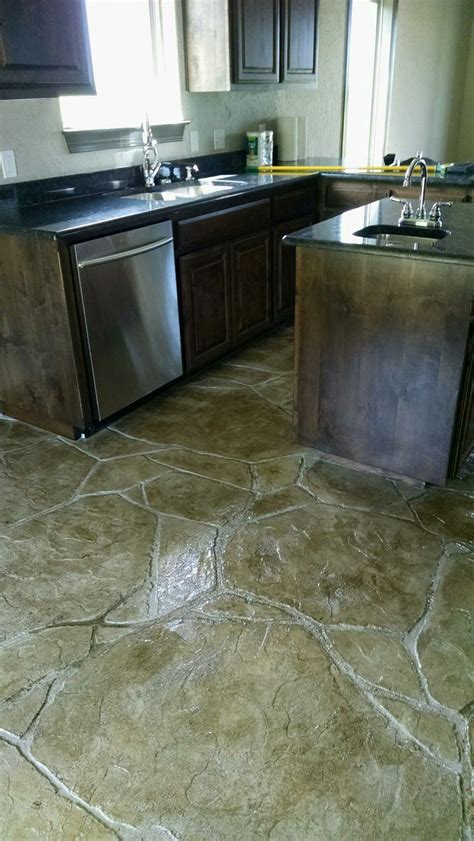 Stamped and stained concrete flooring inside a kitchen! | Stained ...