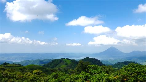 Free stock photo of arenal mountain volcano costarica landscape clouds