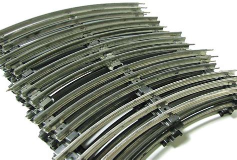 Lionel 0 USED LIONEL POSTWAR O-GAUGE TUBULAR CURVED TRACK (20 PIECES)