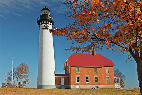 Upper Peninsula of Michigan's Au Sable Lighthouse. Photograph by Larry Geddis - Pixels