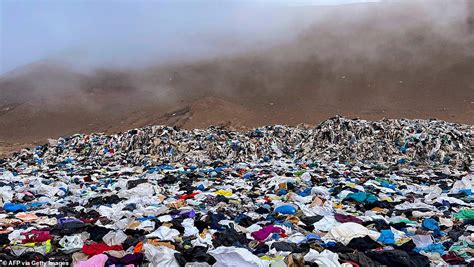 The fast-fashion waste mountain: Gigantic pile of clothes including Christmas sweaters and ski ...